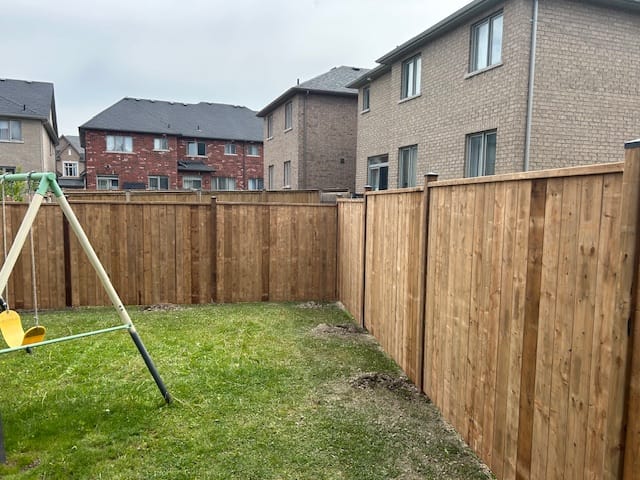 Privacy fence with board together, 4x4 posts.